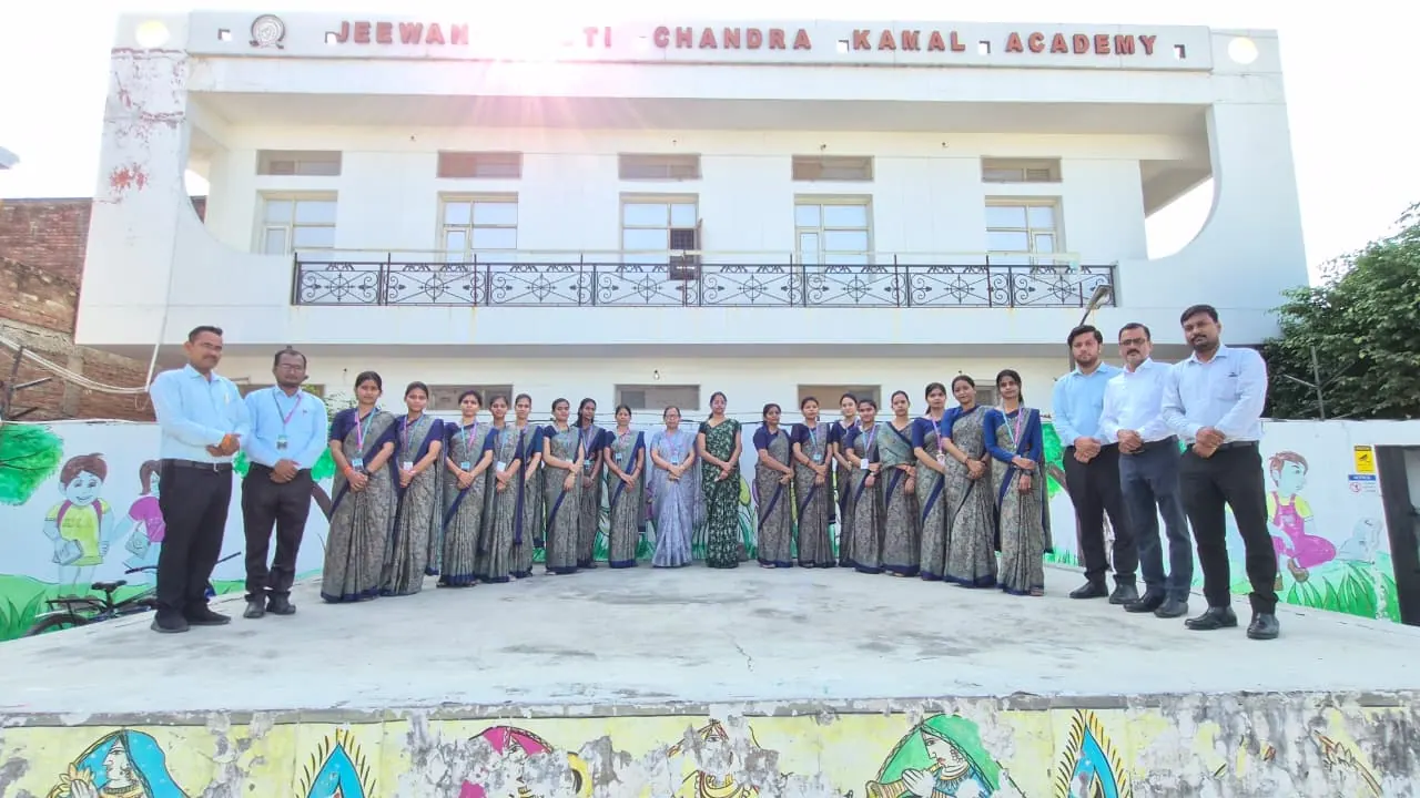 The JJCKA teaching team outside the academy building